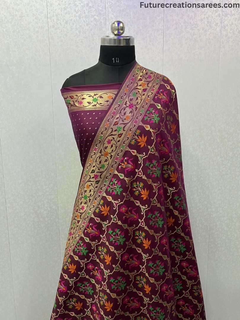 Maroon Semi Katan Banarasi saree with Minakari Zari weaving and designer border, draped on black mannequin