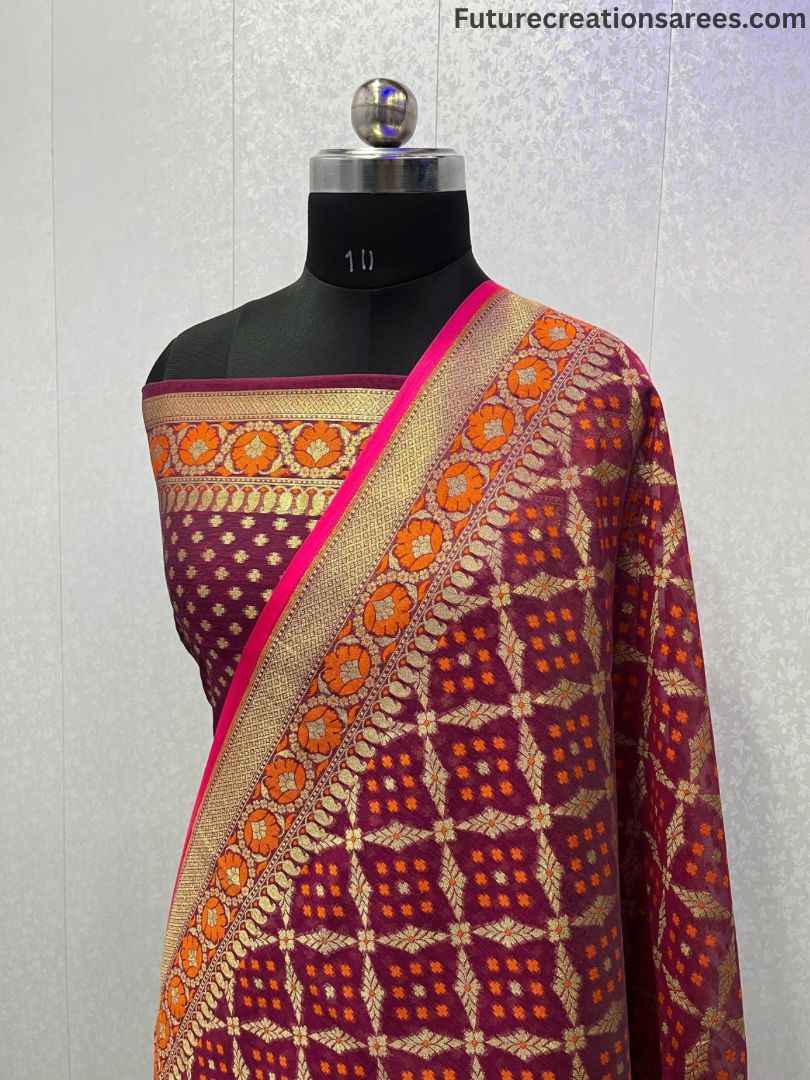 Mannequin wearing maroon cotton zari alfi saree with gold-orange grid body, pink-edged floral border, and dual motif pallu — Future Creation Sarees