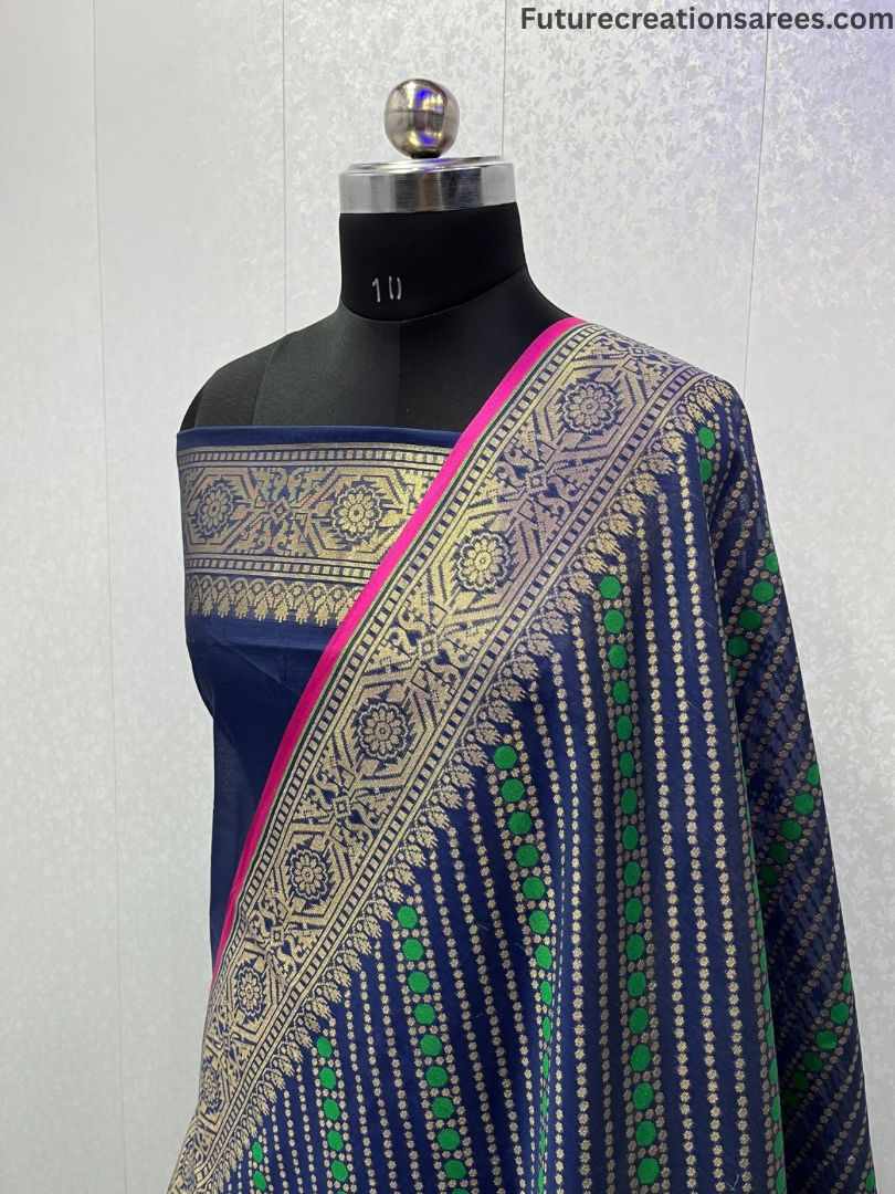 Navy blue Cotton Zari Alfi saree with golden floral embroidery, green-white dotted stripes, and pink-edged border – Future Creation Sarees.