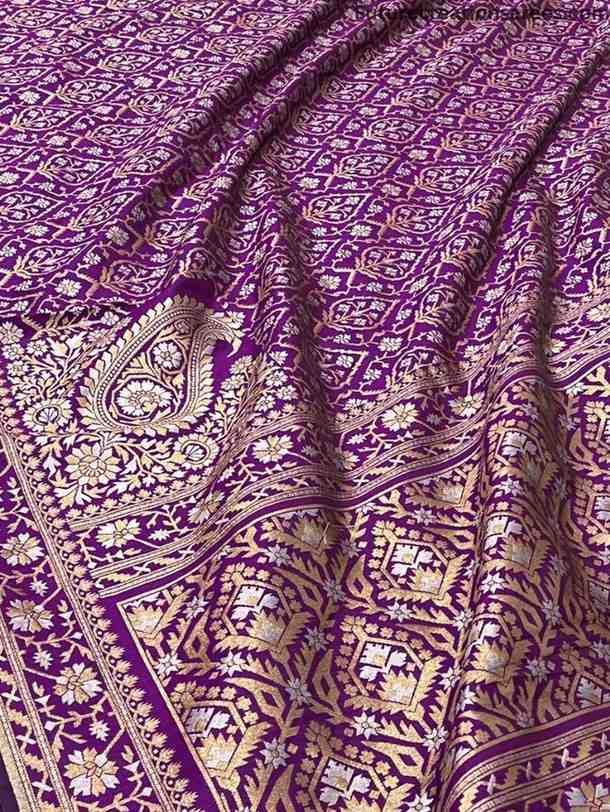 Purple Katan Silk Sona Rupa Banarasi saree with golden-cream floral motifs, geometric border, dotted body, and purple blouse fabric – Future Creation Sarees.